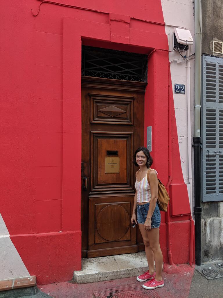 Kaitlin at the front door of Maison Pépouze